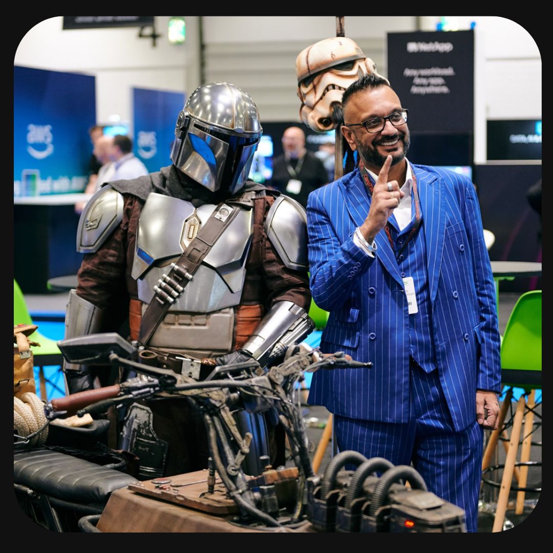 man posing with Star Wars character